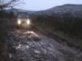 John driving through some mud holes and bouncing around