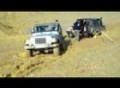 Recovery of Stuck Land Rover Defender in deep mud.