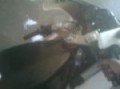 Revin the bike in the car wash