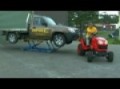 Towing the Cartar Mobile Lift in Auto Body Shop.avi