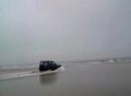 beach offroad land rover