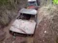 land rover discovery stuck in deep mud hole